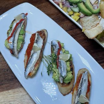 Cafe Sevilla - Boquerones filet -- white fish on toasted bread...the best tapas! - Spanish Near Me - Costa Mesa, California