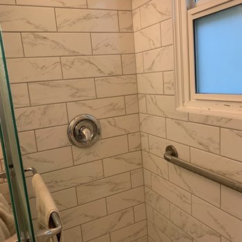 Reilex Construction - Tile shower installed in place of old bathtub - Tiling Near Me