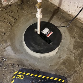 Traditions Plumbing - a drain in a basement - Plumbing Near Me Traditions Plumbing - a drain in a basement - Plumbing Near Me