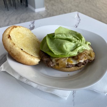 Infinite Delights BC&E - Bakery, Catering, & Event Space - Infinite Beef Burger
Juicy handmade beef patty topped with butter lettuce, sautéed onions, tomatoes, and cheese on a toasted croissant. - Bakeries Near Me - Augusta, Georgia Infinite Delights BC&E - Bakery, Catering, & Event Space - Infinite Beef Burger
Juicy handmade beef patty topped with butter lettuce, sautéed onions, tomatoes, and cheese on a toasted croissant. - Bakeries Near Me - Augusta, Georgia