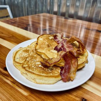 Chicken De-Lite - bacon and pancakes on a plate - Chicken Shop Near Me - Thomasville, Georgia Chicken De-Lite - bacon and pancakes on a plate - Chicken Shop Near Me - Thomasville, Georgia
