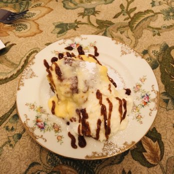 Sweetwater Branch Inn - Pumpkin apple French toast casserole topped with English custard, fresh whipped cream and German apple butter - Bed & Breakfast Near Me - Gainesville, Florida