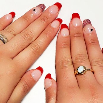 V's Nails Spa - Janet always does a great job with my friend's nails! Peep the teeny black heart. - Nail Salons Near Me - Irvine, California