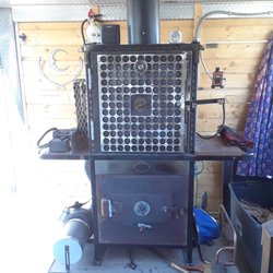 Bohemian Roastery - Our wood-fire coffee roaster was designed, engineered and built by us to raise the bar for what people expect in a daily cup of coffee.