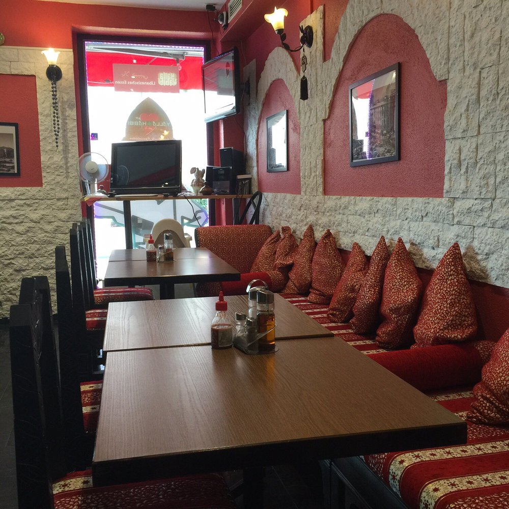 Yalla Habibi - The main seating area next to the takeaway counter - Lebanese Near Me - Zürich, ZH Yalla Habibi - The main seating area next to the takeaway counter - Lebanese Near Me - Zürich, ZH