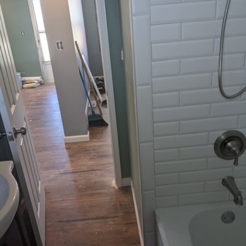 513 Solutions - a view of a bathroom from the hallway - Handyman Near Me 513 Solutions - a view of a bathroom from the hallway - Handyman Near Me