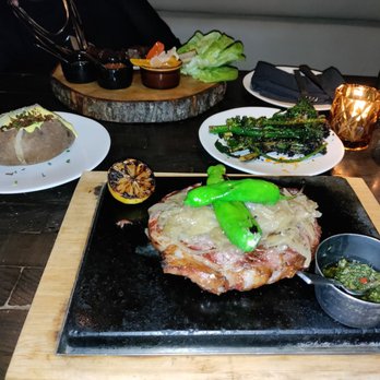dLeña - 30 day dry aged boneless ribeye with broccoli and baked potato - Mexican Near Me - Washington, DC, District of Columbia dLeña - 30 day dry aged boneless ribeye with broccoli and baked potato - Mexican Near Me - Washington, DC, District of Columbia