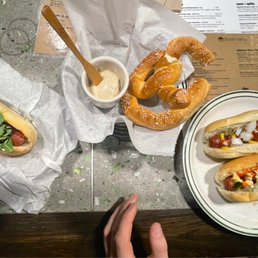 two hot dogs and a pretzel
