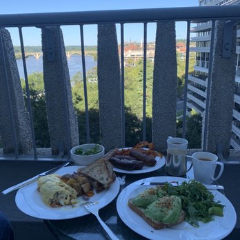 Kingbird - Three Egg Omelet with bacon, tomatoes and goat cheese. Sides of sausage and bacon. Avocado toast. Eaten on our room balcony. - Breakfast & Brunch Near Me - Washington, DC, District of Columbia