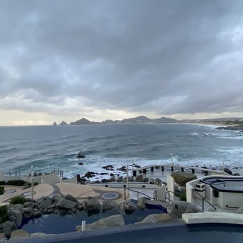 Sunset Monalisa - This evening it was raining on and off, therefore there was seating on the patio.  Still a wonderful view. - Mediterranean Near Me - Cabo San Lucas, BCS