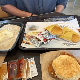 Biscuits and gravy + an egg and spicy honey chicken biscuit + 2 hashbrowns, coffee and OJ