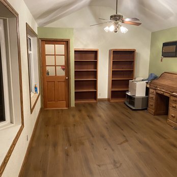 Exceptional Construction - an empty room with wood floors - General Contractors Near Me Exceptional Construction - an empty room with wood floors - General Contractors Near Me