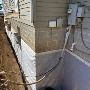 Rock Creek Construction - a water line in the corner of a house - General Contractors Near Me Rock Creek Construction - a water line in the corner of a house - General Contractors Near Me