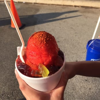 The Frosty Frog - a person holding a bowl of ice cream - Shaved Ice Near Me - San Antonio, Texas The Frosty Frog - a person holding a bowl of ice cream - Shaved Ice Near Me - San Antonio, Texas
