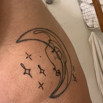 Sideshow Tattoo and Piercing - Moon with minimalist face and sparkles - Tattoo Near Me - San Diego, California Sideshow Tattoo and Piercing - Moon with minimalist face and sparkles - Tattoo Near Me - San Diego, California