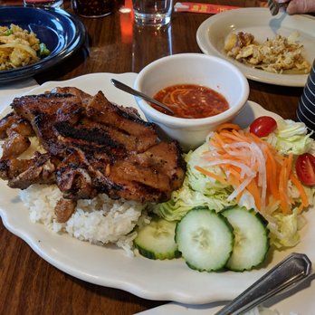 Pho O Sha - Grilled Pork Chop served with rice and salad $11.95 Pho O-Sha 3/2019 - Thai Near Me - Watertown, Massachusetts Pho O Sha - Grilled Pork Chop served with rice and salad $11.95 Pho O-Sha 3/2019 - Thai Near Me - Watertown, Massachusetts