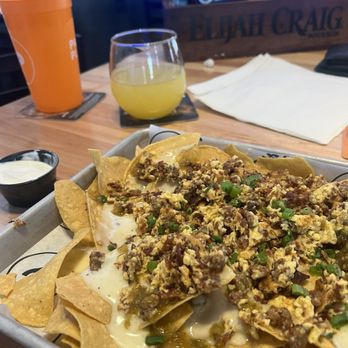 Parks Place Pub - Breakfast nachos and mimosa - Sports Bars Near Me - Fishers, Indiana Parks Place Pub - Breakfast nachos and mimosa - Sports Bars Near Me - Fishers, Indiana