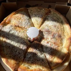 Ultimate Pizza - "Detroit style" small pizza with pepperoni, ham and mushroom.