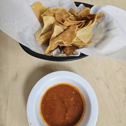 Pupusas Los Primos - House-made tortilla chips with a spicy salsa