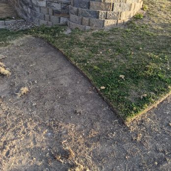 West Coast Landscaping - a stone retaining wall with grass - Gardeners Near Me - Santa Ana, California West Coast Landscaping - a stone retaining wall with grass - Gardeners Near Me - Santa Ana, California