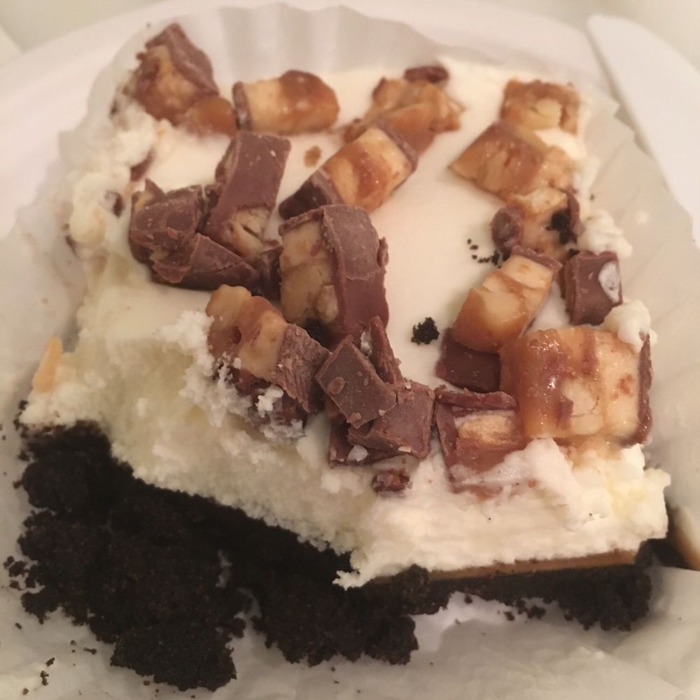 Magnolia Bakery - Snickers icebox bar. Snicker pieces in top of a chocolate cookie like bar - Bakeries Near Me - Chicago, Illinois Magnolia Bakery - Snickers icebox bar. Snicker pieces in top of a chocolate cookie like bar - Bakeries Near Me - Chicago, Illinois