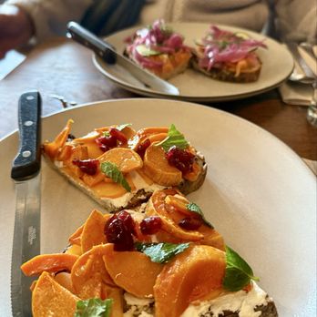 Outerlands - squash toast, salmon toast in the back - New American Near Me - San Francisco, California Outerlands - squash toast, salmon toast in the back - New American Near Me - San Francisco, California