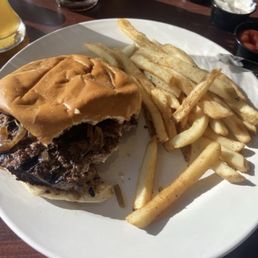 Burger with fried onions and fries. Burger was delicious. Burger with fried onions and fries. Burger was delicious.