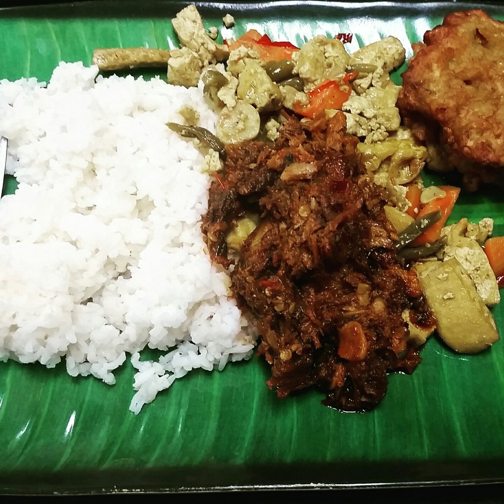 White rice with makerel, stir-fried tofu, and two corn fritters White rice with makerel, stir-fried tofu, and two corn fritters
