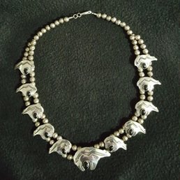 Silver and onyx bear fetish necklace. Silver and onyx bear fetish necklace.