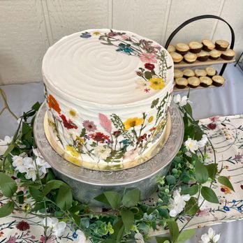 Wow Factor Moments - Wildflower 1st Birthday: custom 3 layer vanilla cake with fresh cut strawberries & cream cheese icing - Balloon Services Near Me Wow Factor Moments - Wildflower 1st Birthday: custom 3 layer vanilla cake with fresh cut strawberries & cream cheese icing - Balloon Services Near Me