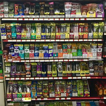Batavia Smoke N Liquor - shelves of various flavored products - Tobacco Shops Near Me - Batavia, Illinois Batavia Smoke N Liquor - shelves of various flavored products - Tobacco Shops Near Me - Batavia, Illinois