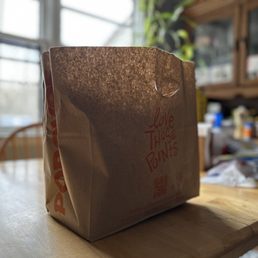 a paper bag on a table a paper bag on a table