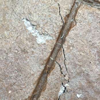 Morici Bros Concrete - Cement peeling off to reveal concrete underneath and cracks - Masonry/Concrete Near Me - New Berlin, Wisconsin