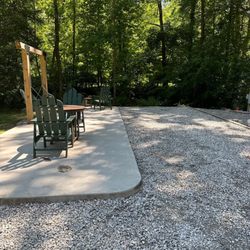 Travelers Rest KOA - The concrete pad next to empty RV spot