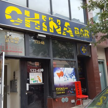 China Bar - a car parked in front of a chinese restaurant - Sports Bars Near Me - Flushing, New York