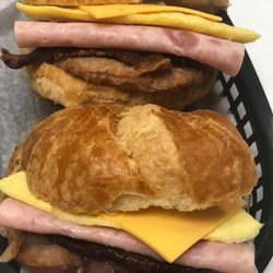 Billy's Donuts - Triple meat croissant sandwich ( sausage; ham; bacon; egg and cheese)