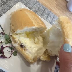 Flore Bakery - French bread with a fried egg and catupiry cheese
