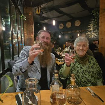 The Ballard Cut - Grandma in grandson, celebrating still, it's good to have a grammar around cheers - New American Near Me - Seattle, Washington The Ballard Cut - Grandma in grandson, celebrating still, it's good to have a grammar around cheers - New American Near Me - Seattle, Washington