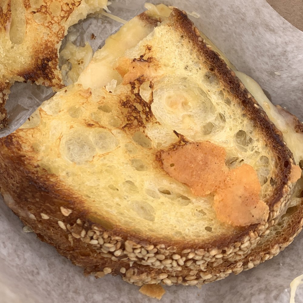 Mima's Toast Bar - Super cheesy, semolina bread, toasty and delish grilled cheese! - Food Stands Near Me Mima's Toast Bar - Super cheesy, semolina bread, toasty and delish grilled cheese! - Food Stands Near Me
