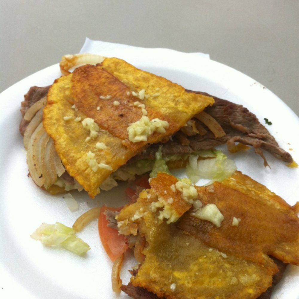 Papo's Taco - Jibarito sandwich! Grilled steak with onions on a fried plantain. - Street Vendors Near Me - Chicago, Illinois Papo's Taco - Jibarito sandwich! Grilled steak with onions on a fried plantain. - Street Vendors Near Me - Chicago, Illinois