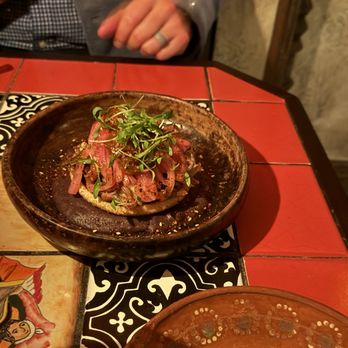 Quixote - Memelita: mole-based dish with carnitas. WOW. The meat was so juicy & tender, and the mole had a rich, deep flavor that did not disappoint. - Mexican Near Me - San Diego, California