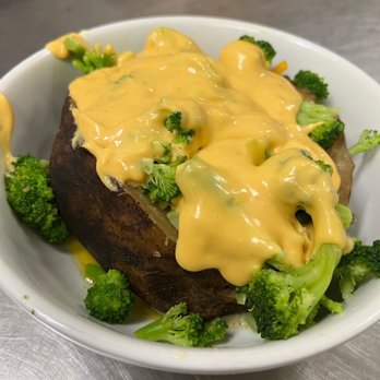 Nacoochee Pub & Grub - Broccoli Cheese Spud: steamed broccoli with creamy cheese sauce - American Near Me - Sautee Nacoochee, Georgia Nacoochee Pub & Grub - Broccoli Cheese Spud: steamed broccoli with creamy cheese sauce - American Near Me - Sautee Nacoochee, Georgia