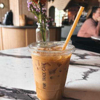 Fair Trade Cafe - Iced Lavender Oatmilk latte - Coffee & Tea Near Me - Phoenix, Arizona Fair Trade Cafe - Iced Lavender Oatmilk latte - Coffee & Tea Near Me - Phoenix, Arizona