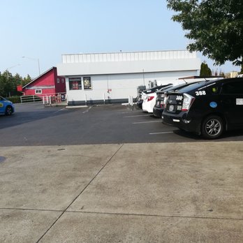 Taqueria Latinos - cars parked in a parking lot - Mexican Near Me