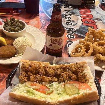 Kenner Seafood - Crab cakes with green beans and potato salad for my wife and an oyster Po-boy with onion rings for me! - Seafood Near Me - Kenner, Louisiana Kenner Seafood - Crab cakes with green beans and potato salad for my wife and an oyster Po-boy with onion rings for me! - Seafood Near Me - Kenner, Louisiana