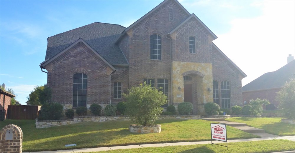 Slide of Reid's Roofing