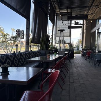 Urban Plates - Outside patio off PCH with wind guards and heaters - New American Near Me - Long Beach, California Urban Plates - Outside patio off PCH with wind guards and heaters - New American Near Me - Long Beach, California