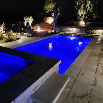 California Pools - Thousand Oaks - Night view with fire pit - General Contractors Near Me California Pools - Thousand Oaks - Night view with fire pit - General Contractors Near Me