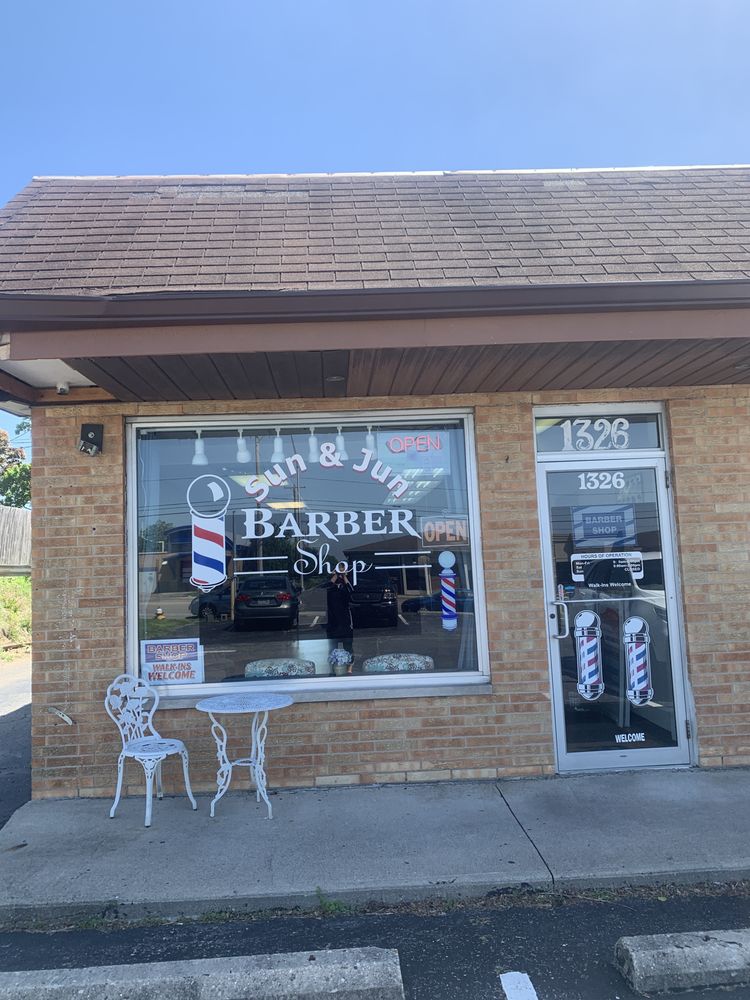 Sun & Jun Barber Shop Logo