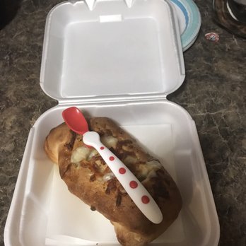 Jp's Pub & Pizzeria - WARNING: That's how big their $11 calzones are!! That's a baby spoon, it sits in a small take out container. Ridiculous! - Pubs Near Me - Lake View, New York Jp's Pub & Pizzeria - WARNING: That's how big their $11 calzones are!! That's a baby spoon, it sits in a small take out container. Ridiculous! - Pubs Near Me - Lake View, New York